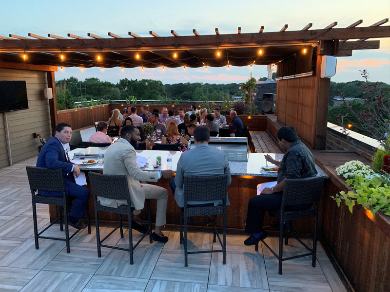 Partner, Paul, hosted 30 clients and friends on his city rooftop deck and celebrated with Napa Valley wines and a private gourmet meal.